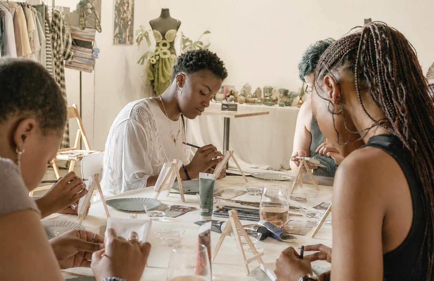 Young people taking part in a wellbeing workshop around a table